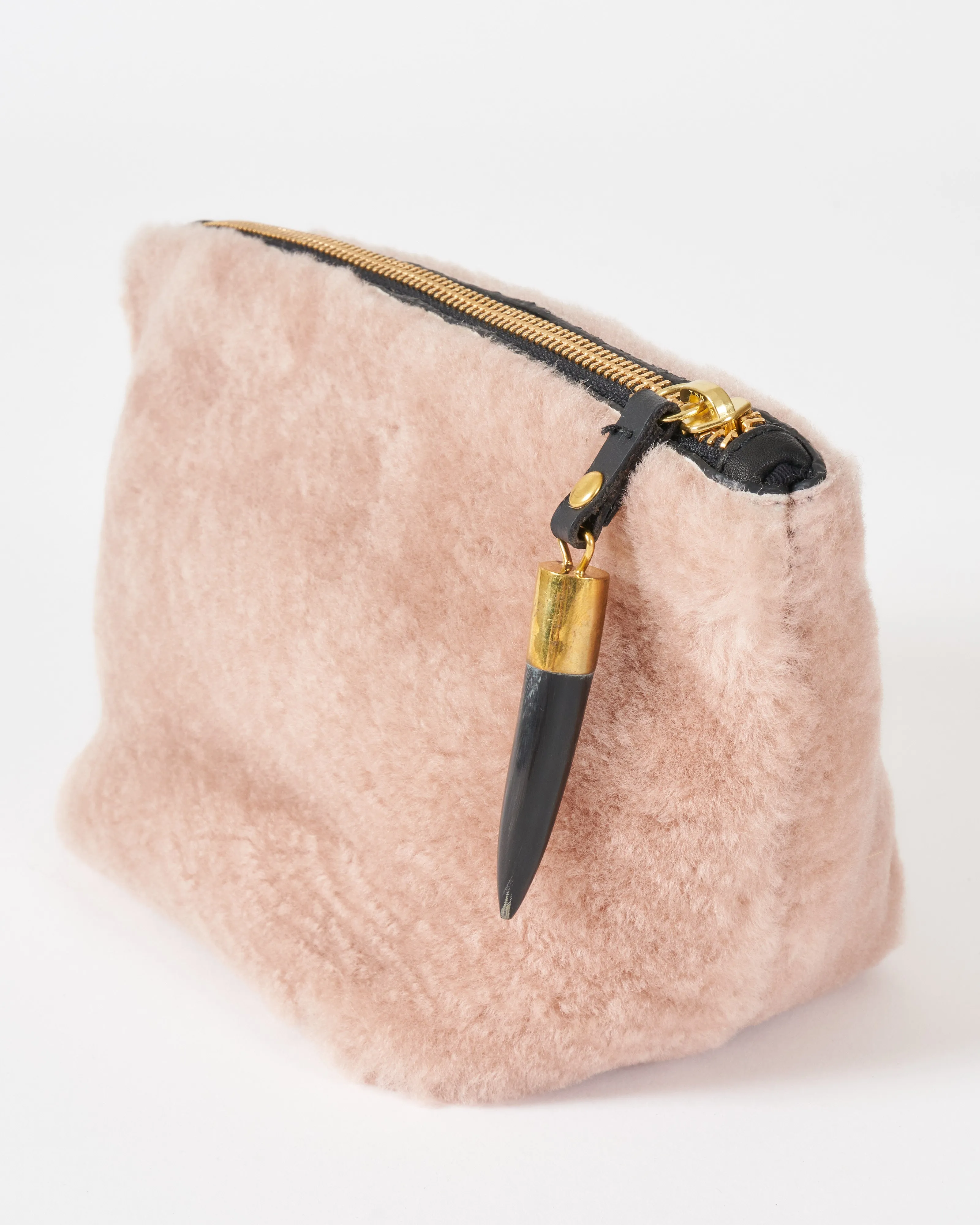 blush shearling makeup bag