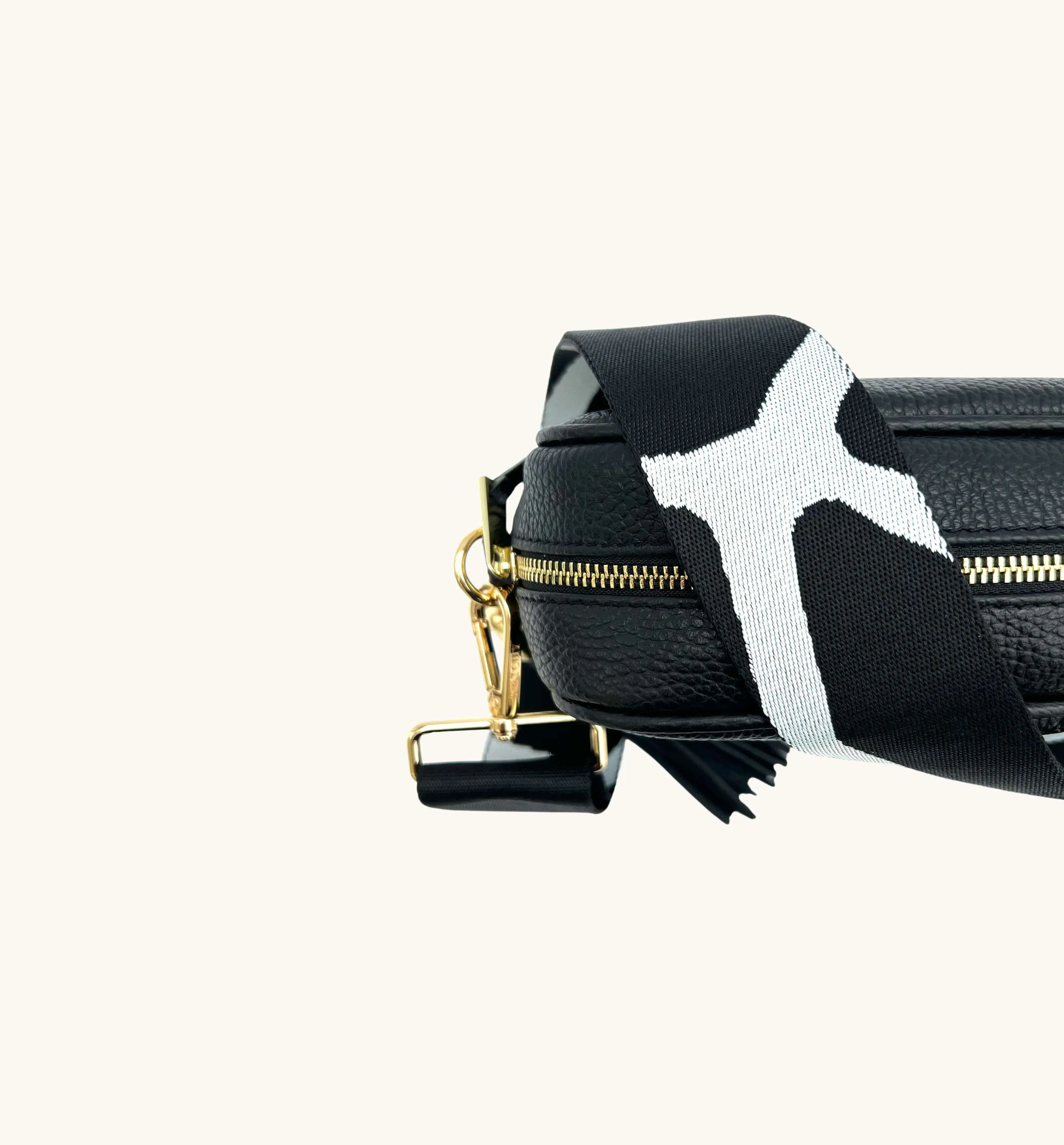 The Tassel Black Leather Crossbody Bag With Black & White Giraffe Strap